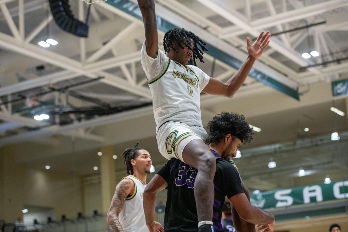 Sophomore forward Brandon Gardner celebrates after dunking on a San Francisco State defender Tuesday, Nov. 25, 2025. Gardner finished the game with seven points, including two alley-oop dunks.