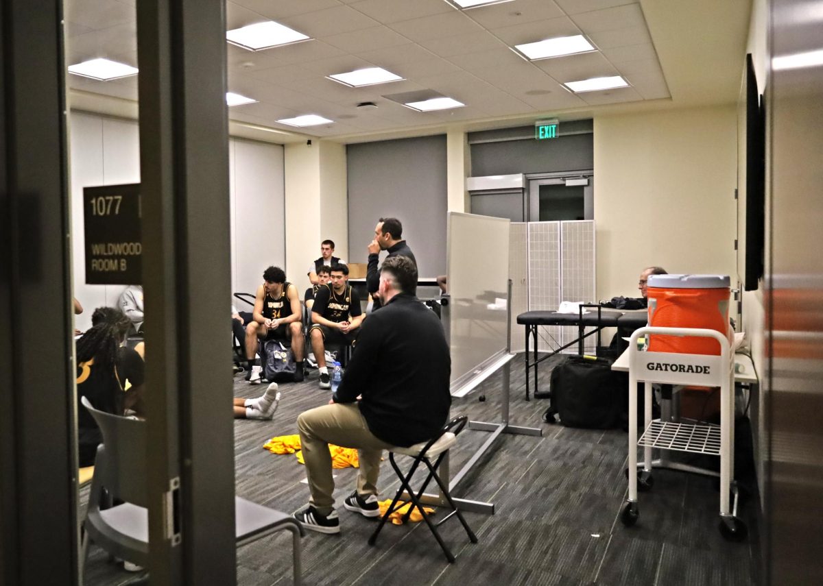 Dominican University of California men’s basketball debriefs in the away locker room after their loss to Sac State by a score of 103-79 on Tuesday, Nov. 4, 2025. The opposing team’s locker room is located inside a classroom in The WELL. 