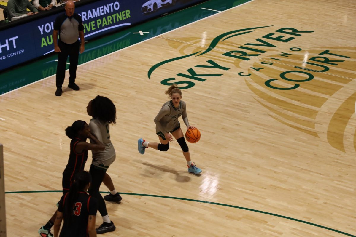  Junior guard Natalie Picton looks to drive in with the ball on Monday, Dec. 15, 2025. Picton scored a career-high 27 points against the Simpson Red Hawks.
