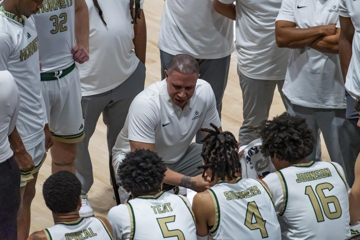  Head coach Mike Bibby talking to his team during a break against Northern Arizona Thursday, Jan. 15, 2026. The game against the Lumberjacks was Sac State’s first Big Sky win of the year. 