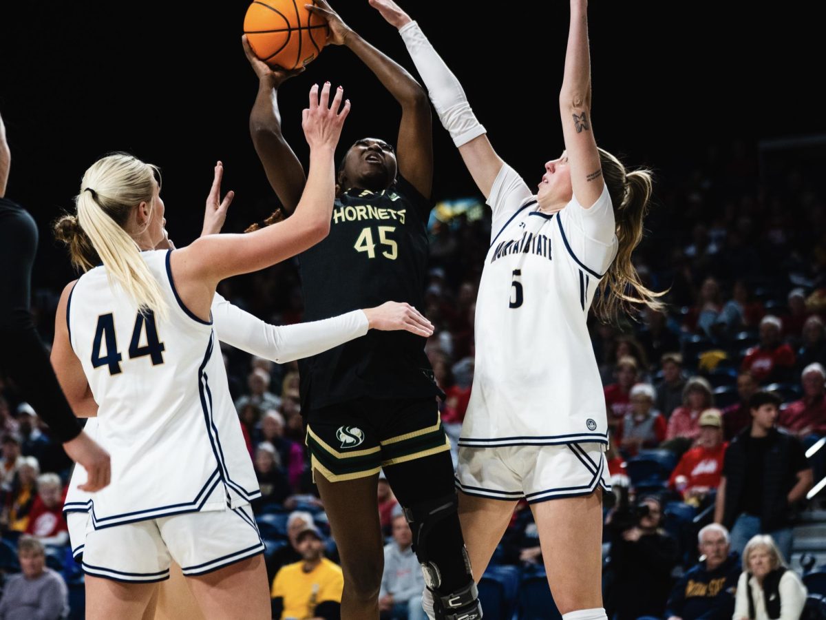 Senior forward Fatoumata Jaiteh jumps from under the rim in an attempt to score against Montana State defenders on Thursday, Jan. 29, 2026. Jaiteh recorded eight rebounds in the loss to the Bobcats. (Photo courtesy of Jyanne Bautista)