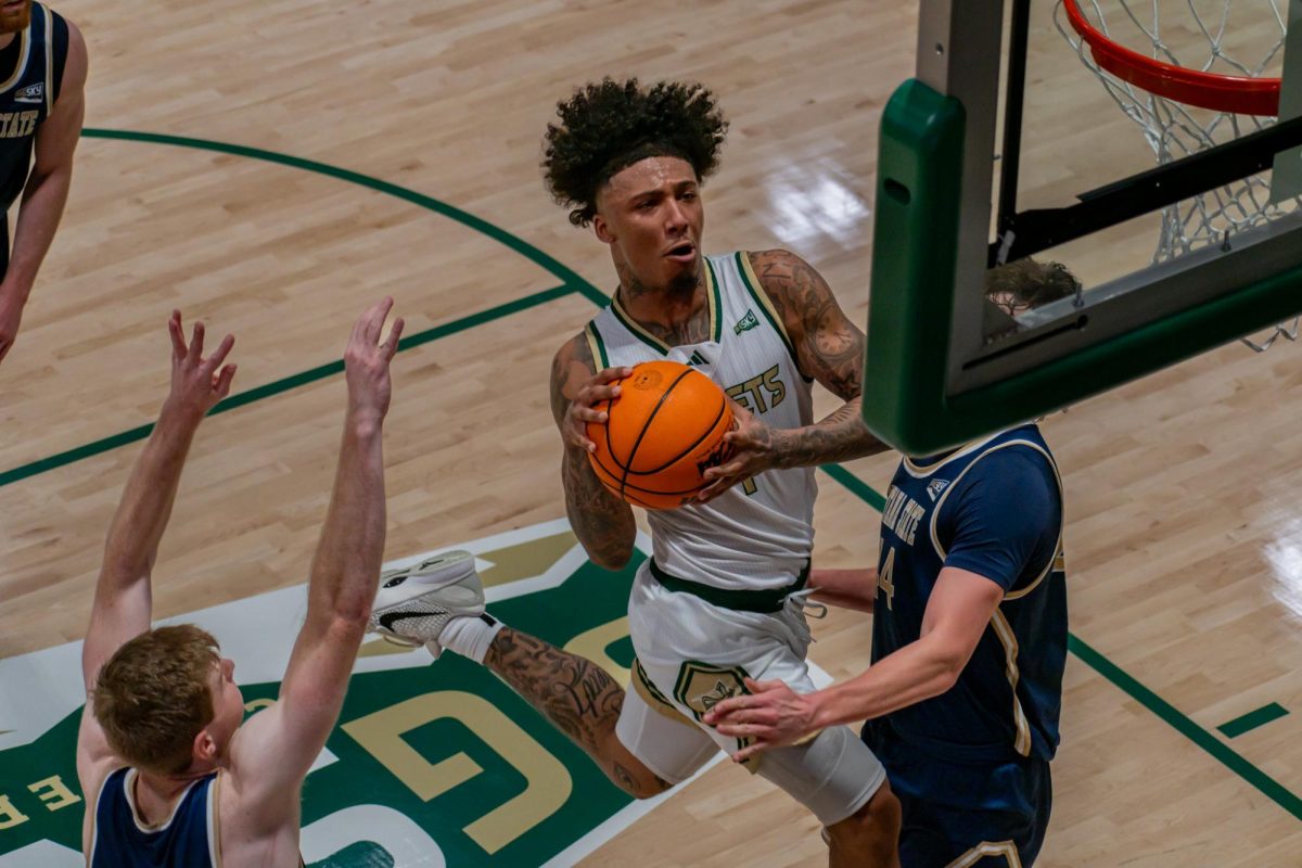 Sophomore guard Mikey Williams attempting an acrobatic layup against Montana State Thursday, Jan. 29, 2026. Williams finished the game with 23 points, the second most for the Hornets.