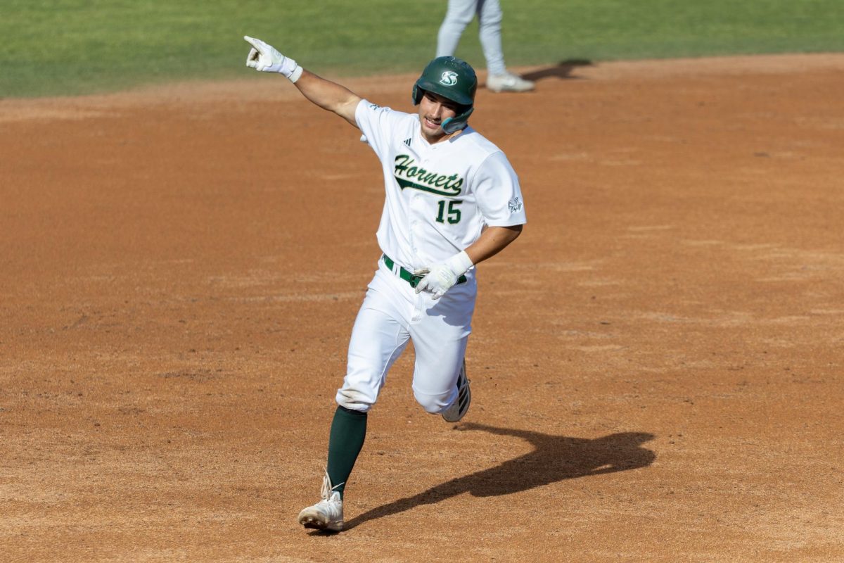 Redshirt junior third baseman Jakob Poturnak rounds the bases after a home run against Saint Joseph’s University on Saturday, Feb. 21, 2026. The Hornets won 3-4 games in the series. 