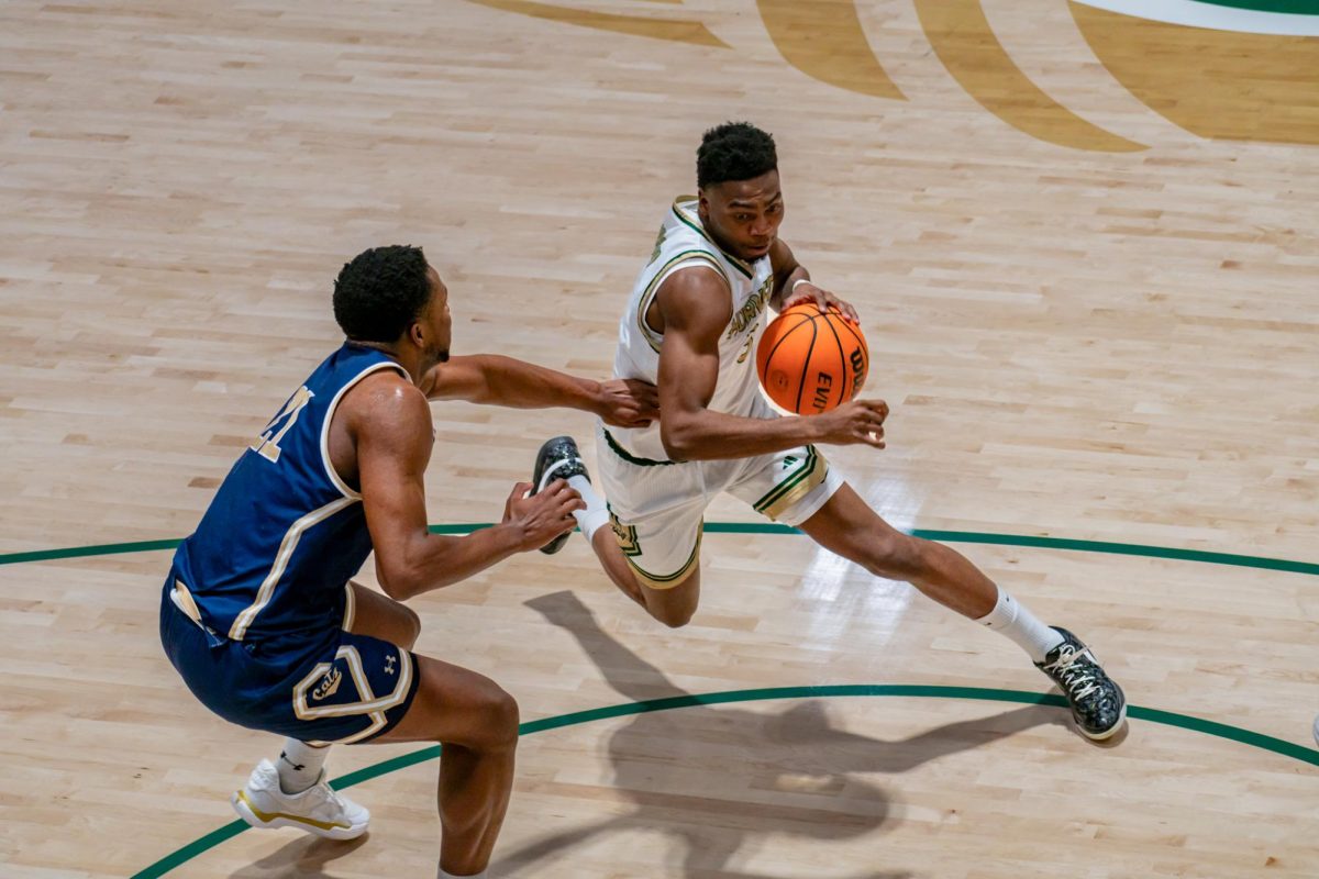 Freshman guard Romari Robinson drives to the hoop against Montana State Thursday, Jan. 29, 2026. Robinson got his first ever collegiate start against the Bobcats Saturday, Feb. 28, 2026.