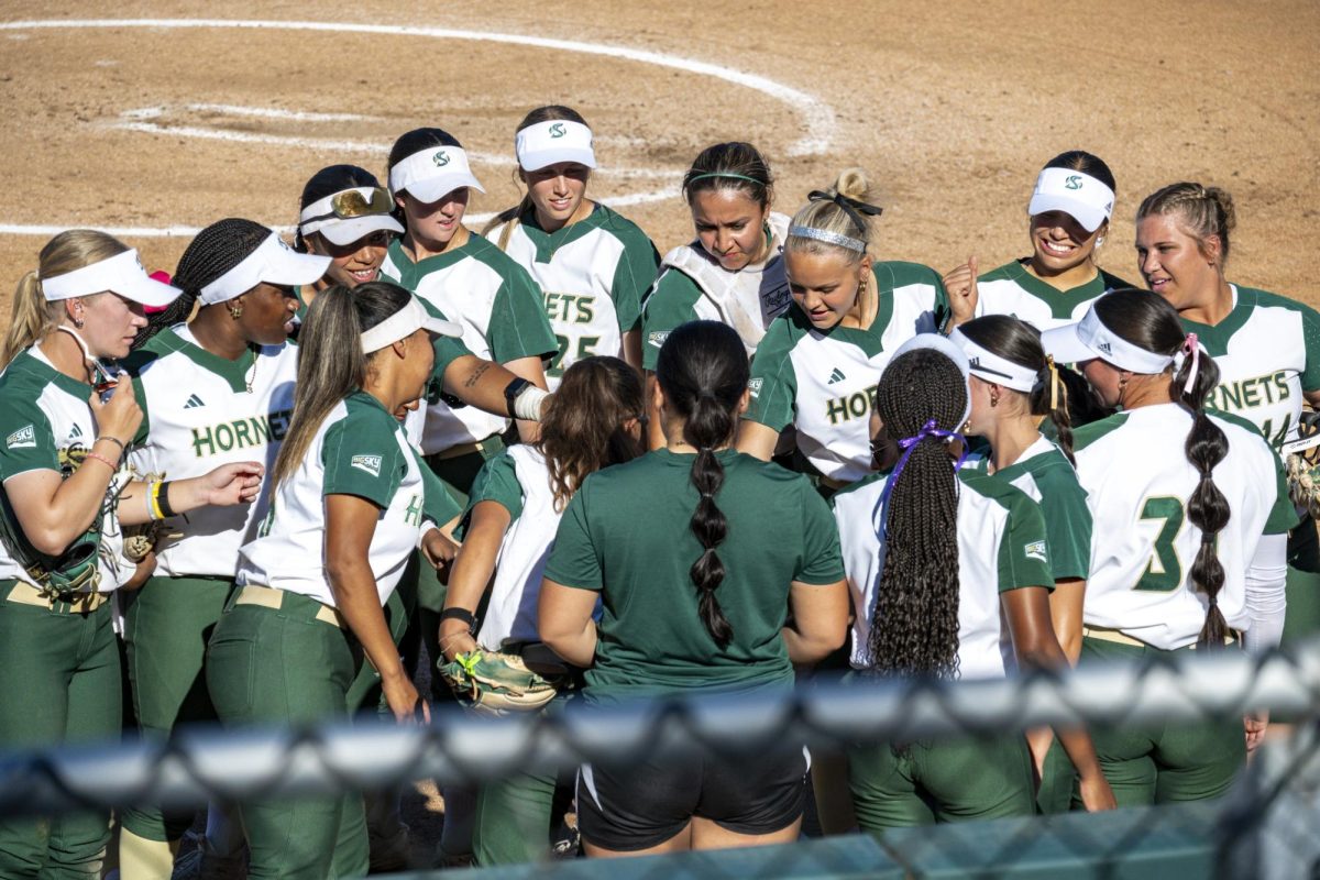 Sacramento State softball huddles up after shutting down the UC Davis offense on March 24, 2026. The Hornets lost their opening Big Sky series against Northern Colorado, 2-1. 