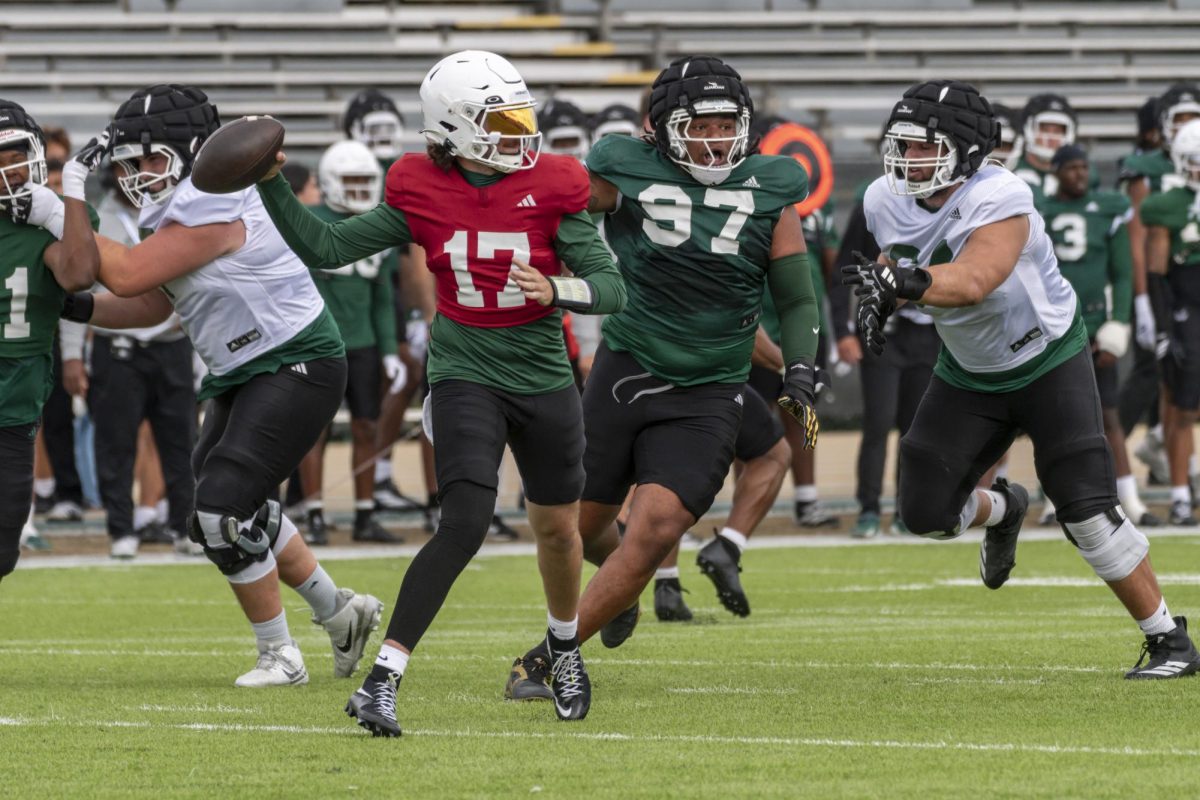 Junior quarterback Carson Conklin rolls out to throw during Sac State’s annual spring game Saturday, April 25, 2026. Conklin made his return to Sac State after spending last season at Fresno State. 
