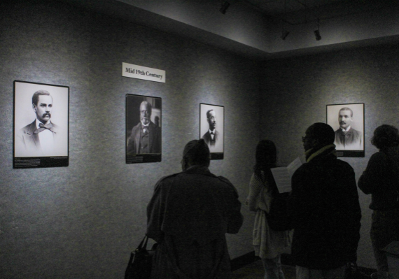 Guests view portraits at the ‘16 Black Classicists’ gallery in the University Union Gallery Thursday, Jan. 30, 2025. The gallery focuses on Black scholars in classicism.